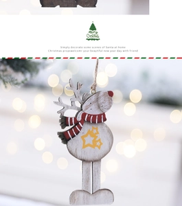 Detail of wooden reindeer ornament with red scarf and yellow star for Christmas decor