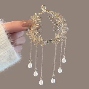 Golden leaf bun hair claw with sparkling rhinestones and teardrop pearl tassels
