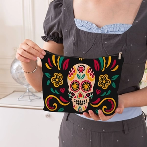 Portable Day of the Dead makeup bag featuring colorful sugar skull print and zipper
