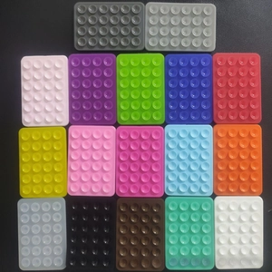 Detailed matrix display of colorful silicone suction pads with 24 mini vacuum cups