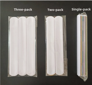 Three variants of Christmas slap bracelets in transparent packaging, 1, 2, and 3-piece sets