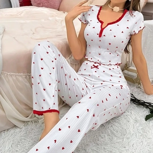 Women's heart print pajama set with V-neck short sleeve top and long pants in white