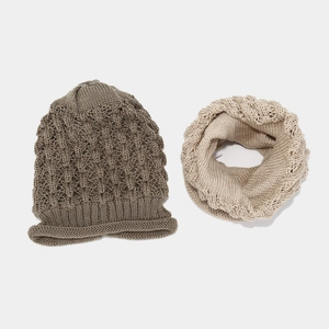 Winter knit beanie and infinity scarf set in warm brown and oatmeal shades for outdoors