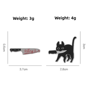 Detail showing Killing it knife and black cat with dagger enamel pins and dimensions
