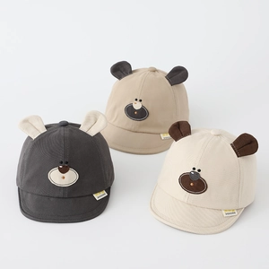 Detailed embroidery of cartoon bear face and 3D ears on a soft brim baby baseball cap