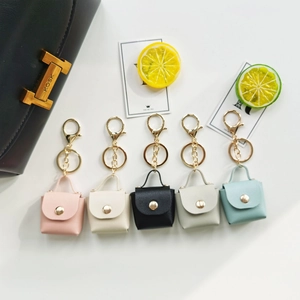 Porte-clés mini sac en cuir de couleur unie, joli anneau de clé de voiture et pendentif de sac.