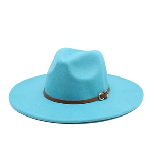 Close-up of sky blue fedora hat featuring a stylish brown leather belt and metal buckle