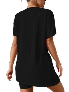 Rear view of women's casual black crew neck batwing sleeve top and shorts set