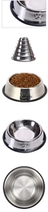 Detail view of stainless steel pet bowls showing paw patterns and non-slip rubber bases