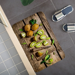 Macro detail of rectangle flannel bath mat featuring vintage kiwi and wood plank design