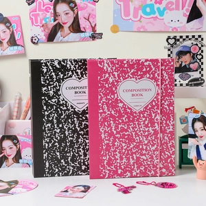 Detail of A5 composition book with stone texture and heart label for photo cards