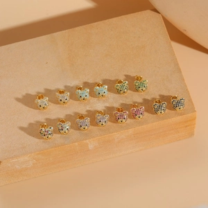 Sparkling pave bear stud earrings set in colorful zircon stones and gold finish