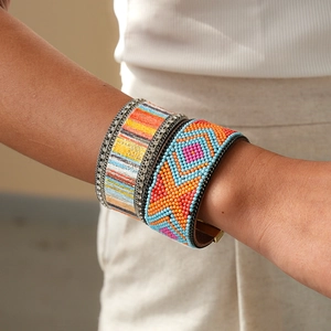 Bohemian multilayer wide beaded bracelet with colorful rhinestones on a female wrist