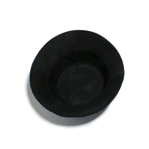 Top-down view of black bucket hat interior showing clean stitching and colorful brim pattern