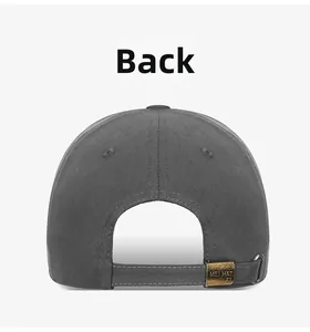 Detail view of the dark grey cotton baseball cap with an adjustable bronze metal buckle