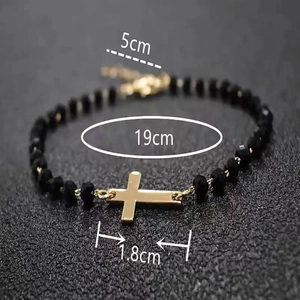 Detailed view of obsidian bead bracelet showing 19cm circumference and 5cm extension chain