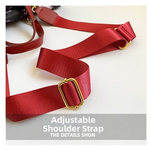 Detail of red nylon shoulder strap with adjustable golden metal buckle for tote bags
