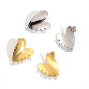 Polished heart shaped earrings with sparkling zircon tassels in gold and silver finish