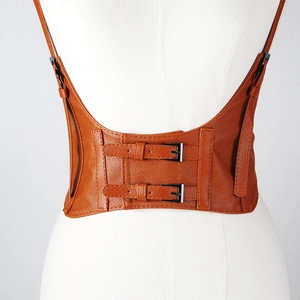 Rear view of brown leather corset belt with double buckle closure on white mannequin