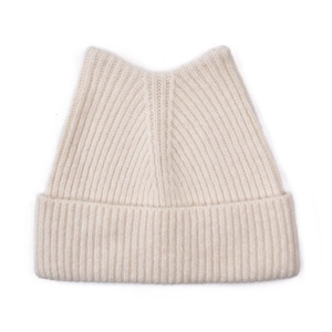 Close-up of cream white cat ear knit hat with detailed ribbed texture for winter warmth