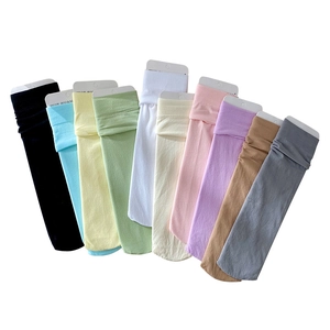Ten pairs of thin velvet cotton socks in assorted pastel macaron colors with packaging