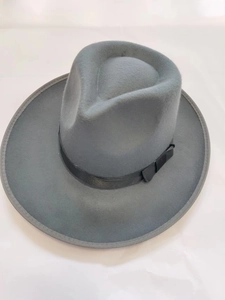 Overhead view of gray wool felt fedora with black satin ribbon and wide brim detail