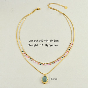 Detail of double-layer gold necklace with blue drip oil pendant and sizing info