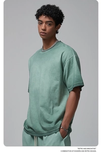 Detailed view of Morandi green washed vintage cotton T-shirt and matching shorts