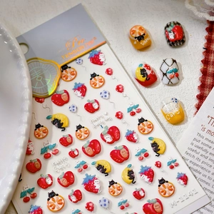 3D embossed nail stickers featuring cute fruit and cat motifs on natural nails