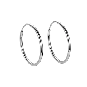 Classic S999 sterling silver hoop earrings with a polished minimalist round design for women