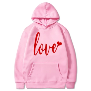 Pink pullover hoodie with red love text and heart print on a clean white background