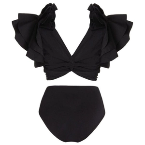 Detail view of black bikini top with tiered ruffles and high-waisted bottom on white background