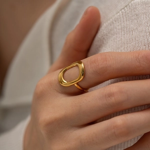 Elegant 18k gold plated stainless steel hollow geometric ring on model hand