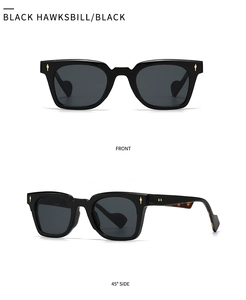 Front and side view of black cat-eye sunglasses with gold metal flame rivets