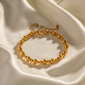 18K vergoldetes Edelstahl-Kugelarmband mit verstellbarem Schiebeverschluss auf Seide