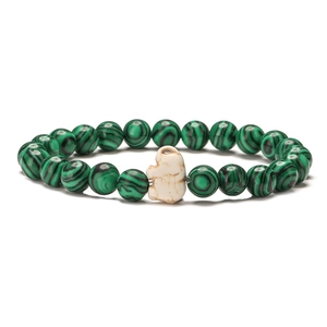 Detailed view of green malachite beads and a white accent stone on an elastic bracelet