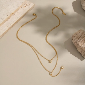 Elegant gold double-layered Y-shaped necklace with sparkling round zircon stones