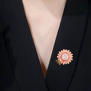 Enamel sunflower brooch with bee on black suit, crystal paved petals jewelry accessory
