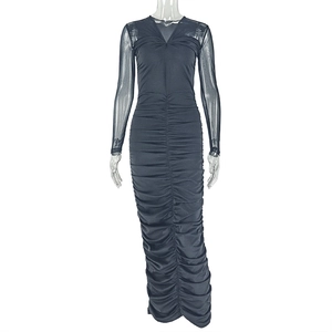 Detail of ruched V-neck bodycon dress with sheer mesh long sleeves and pleated gray fabric