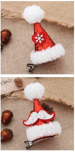 Detail of red sequined Christmas hat hair clips with festive snowflake and beard patterns