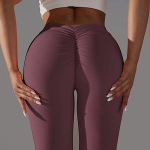 Detailed back view of scrunch butt yoga pants highlighting peach lift and fabric texture