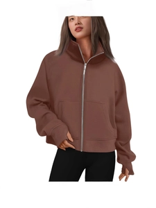 Women's brown full-zip hoodie featuring a stand collar and thumb holes in a loose fit