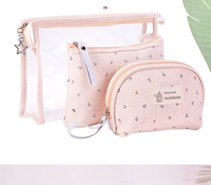 Three-piece set featuring transparent PVC and pink anchor fabric cosmetic travel storage bags