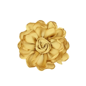 Detailed texture of satin fabric rose in vintage gold for DIY hair accessories