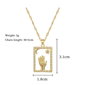 Detailed size chart for Hamsa hand necklace with crescent moon and star dimensions