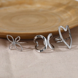 Minimalist 316L stainless steel ring set with butterfly, geometric and heart shapes