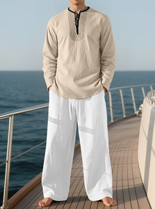 Linen long sleeve shirt and trousers set with textured fabric on yacht deck