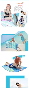 Detail van microfiber strandlakens met bloem- en streepmotieven, sneldrogend ontwerp
