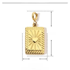 Detailed view of a gold heart engraved stainless steel pendant with size specifications