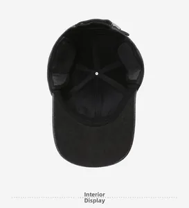 Interior view of winter baseball cap showing thick ear flaps and adjustable metal buckle